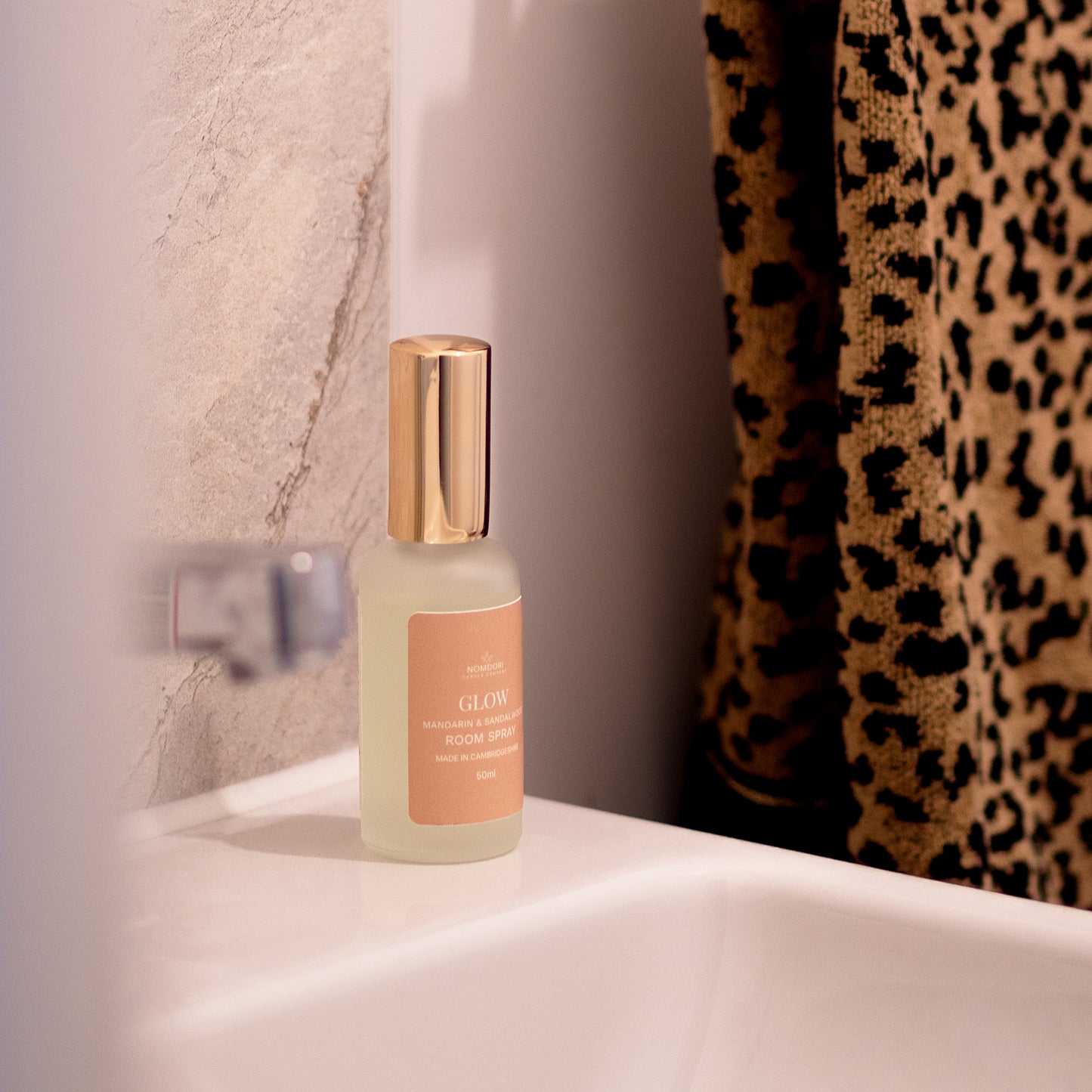 Nomdori Glow 50ml room spray in Mandarin & Sandalwood, elegantly luxury home fragrance spray UK